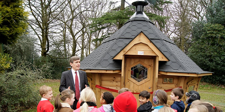 Cabins For Schools building with headteacher and red ribbon with schoolkids grand opening