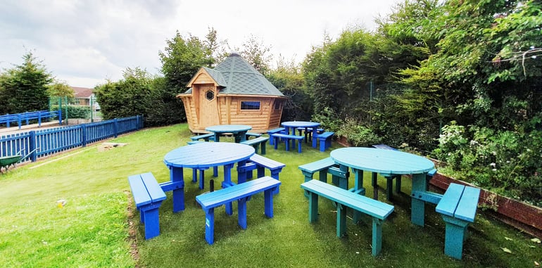 Timber Forest School Cabin in picnic area at school