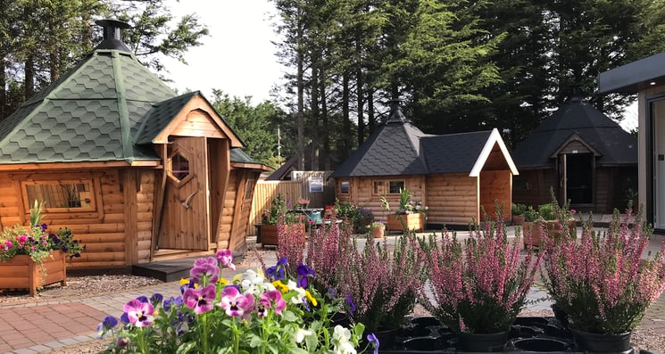 School hut show site shot showing two forest school cabins