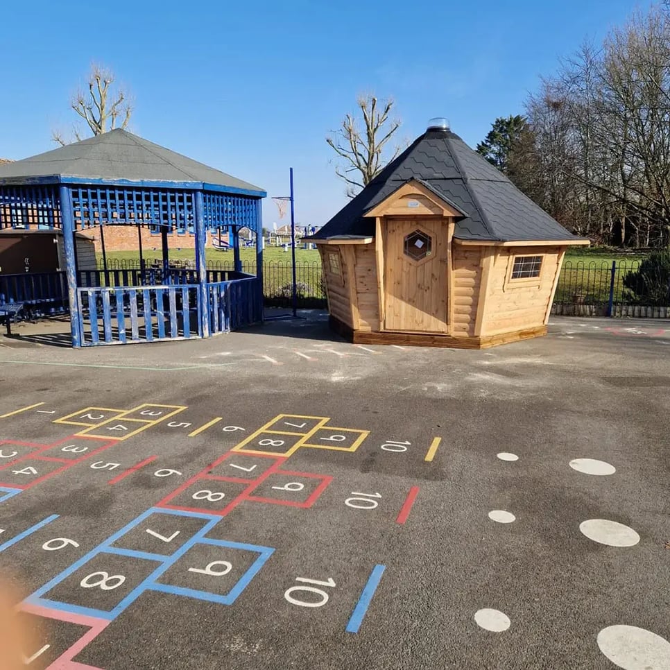 log cabin on playground