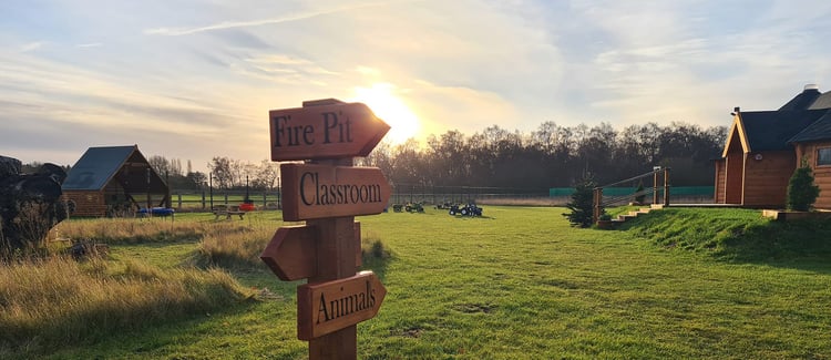 Distanced shot of school cabins within a countryside setting