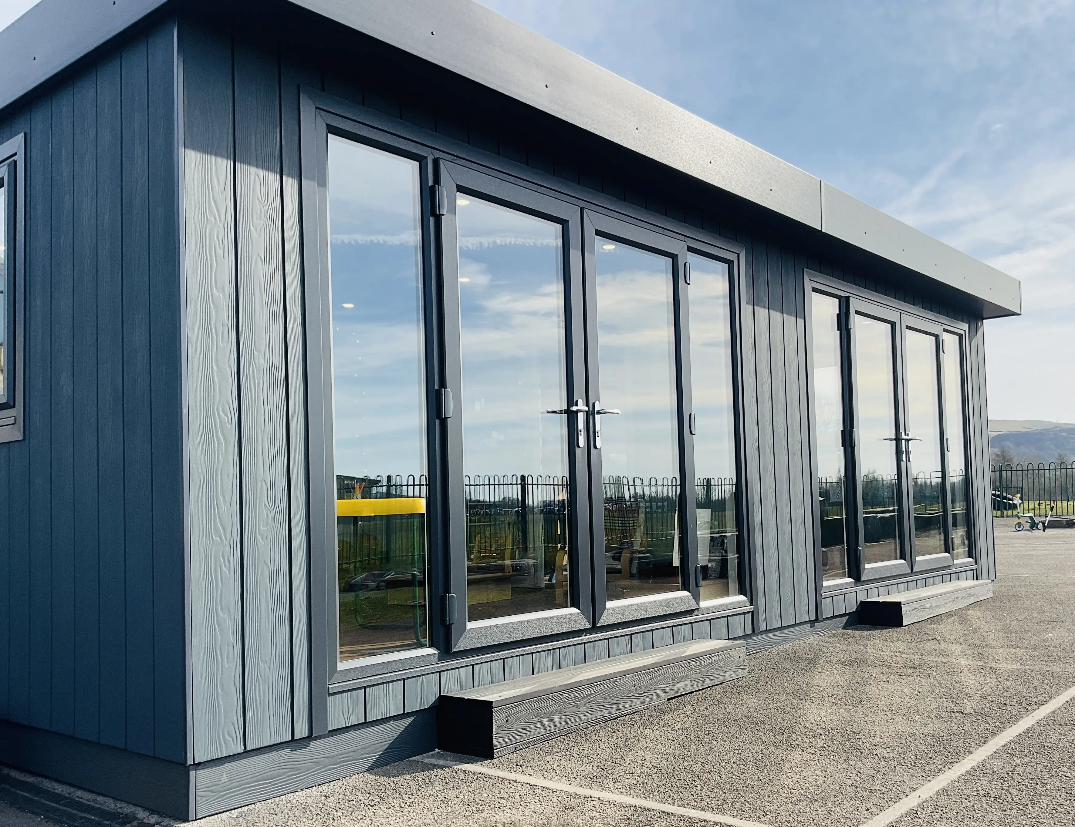 modular building for education designed and installed by Cabins for Schools with marley board cladding and an internal partition wall