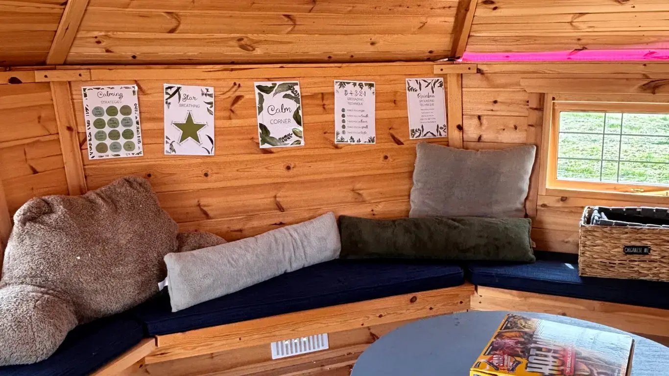 school transition space log cabin with calming activities