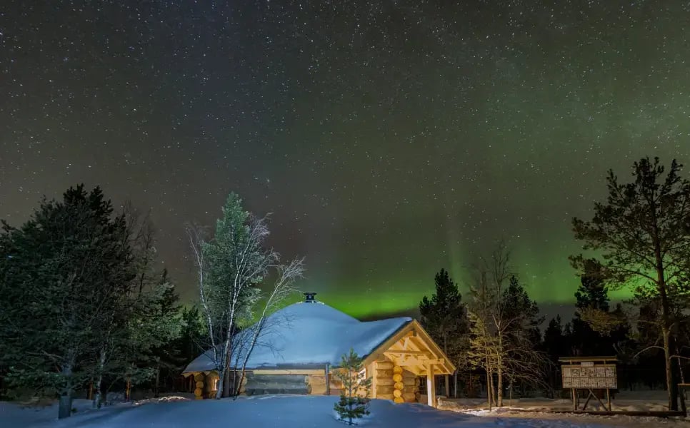 arora-behind-log-cabin