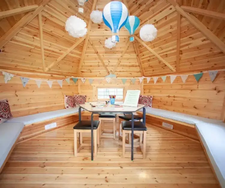 cabin-decorated-with-baloons-flags-opt