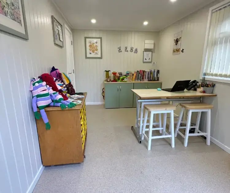 office-cabin-with-desk-dolls-books